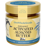 A jar of LiveWholefoods Organic Activated Almond Butter on a plain white background. The jar has a gold lid and a cream-colored label with blue text and illustrations, showing the product inside.
