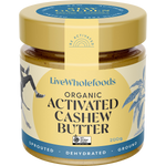 A jar of LiveWholefoods Organic Activated Almond Butter on a plain white background. The jar has a gold lid and a cream-colored label with blue text and illustrations, showing the product inside.