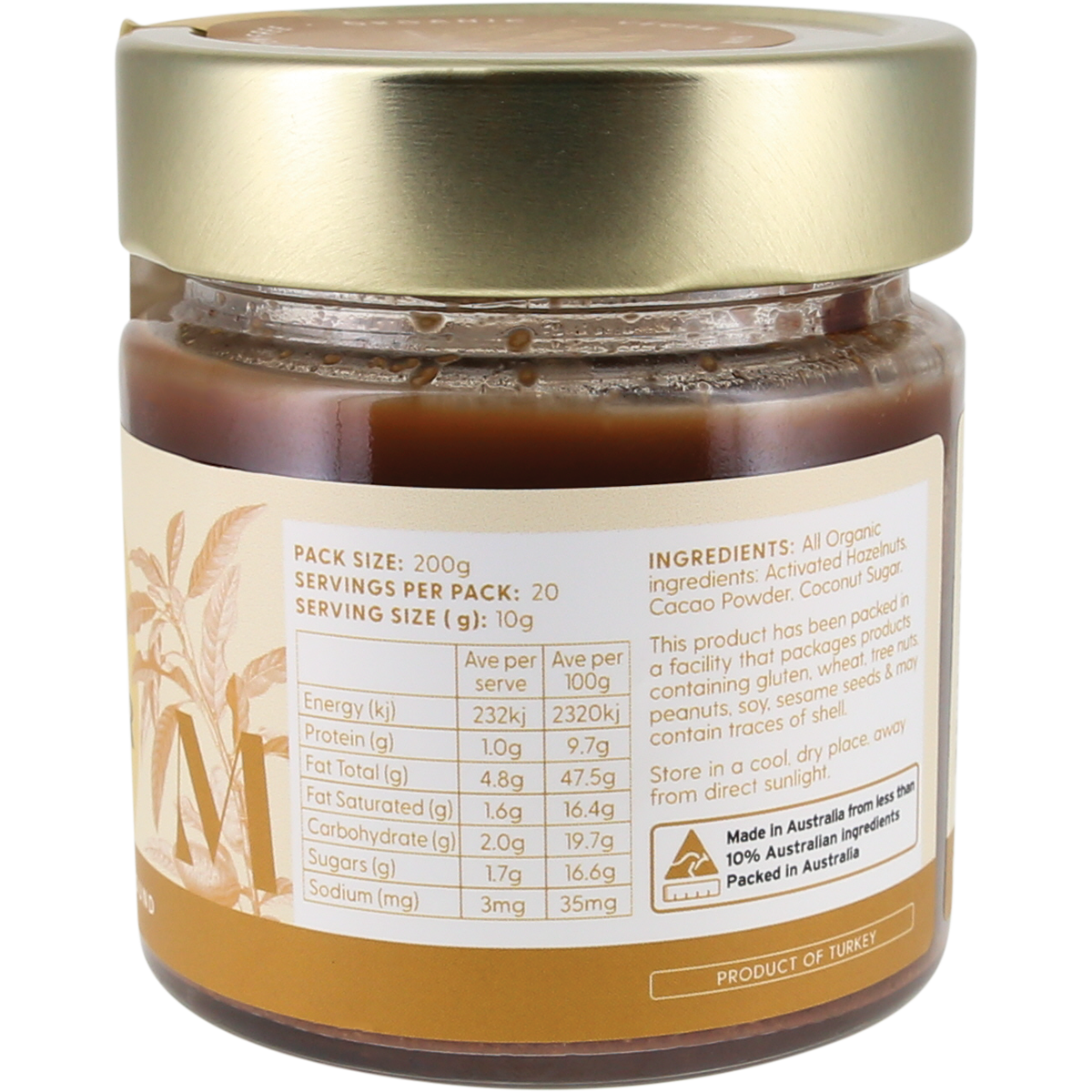 A jar of Sunrise Cocoa Powder with a gold lid and a beige label showing nutritional information and ingredients, set against a plain white background.
