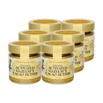 Six jars of Live Whole Foods Organic Activated Hazelnut Cacao Butter arranged in two rows on a solid white background.