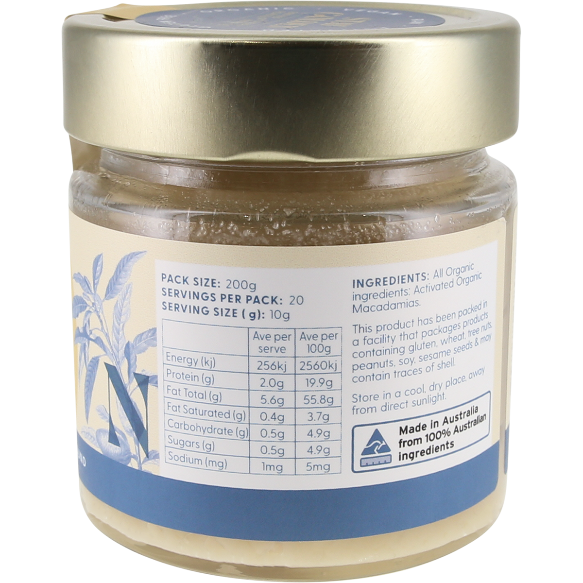 A jar of Organic Macadamia butter with a silver lid and a cream-colored label featuring blue text and illustrations, set against a plain white background.