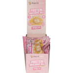 Retail display box of Macro Mike Birthday Cake Protein Indulgence Balls with individual 40g packs on a white background.