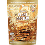 Macro Mike Peanut Butter Brittle Peanut Plant Protein 520g bag with a scoop and peanut graphics on a white background.