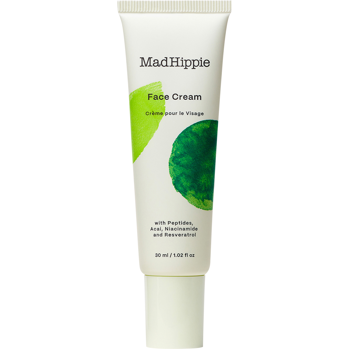 Mad Hippie Face Cream in a white squeeze tube with green leaf graphics, shown on a plain white background.