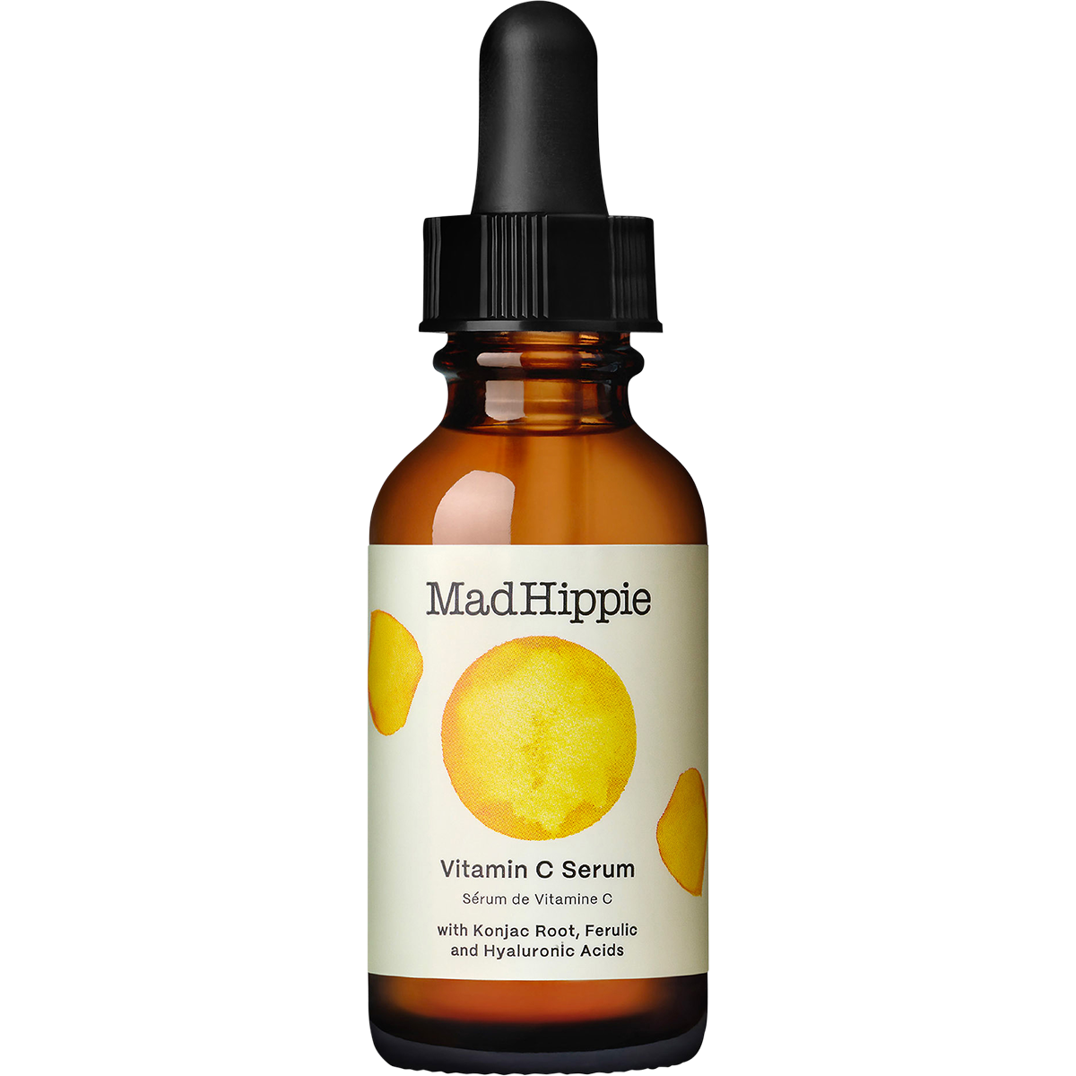 Mad Hippie Vitamin C Serum in an amber glass dropper bottle with a cream label featuring yellow citrus graphics, set against a plain white background.