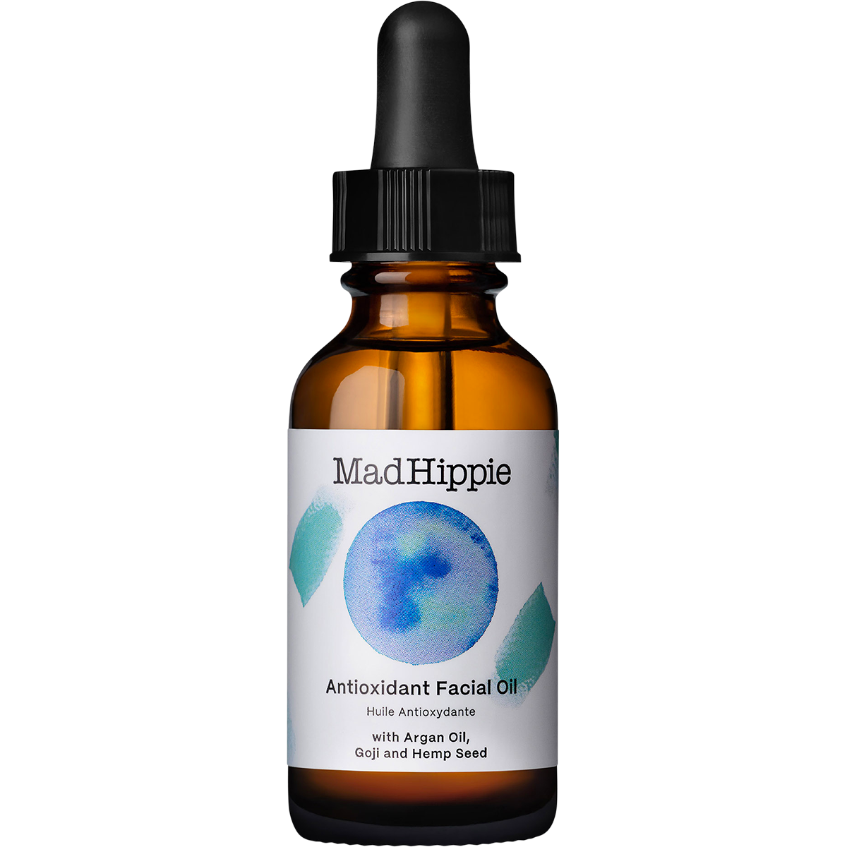 Mad Hippie Antioxidant Facial Oil in an amber glass dropper bottle with a white label and black cap, isolated on a white background.