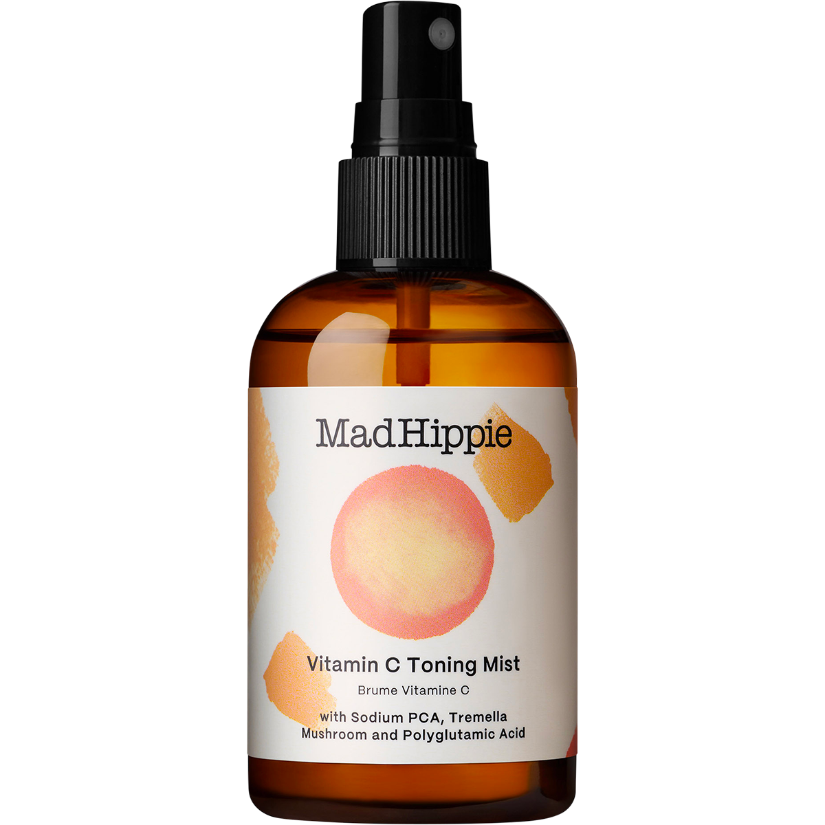 Mad Hippie Vitamin C Toning Mist in an amber glass spray bottle with a black pump dispenser and a white label featuring a pinkish-orange circle graphic.