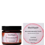 Mad Hippie Microdermabrasion Facial jar next to its white and pink packaging box, featuring a black lid and a black text label on a clean white background.