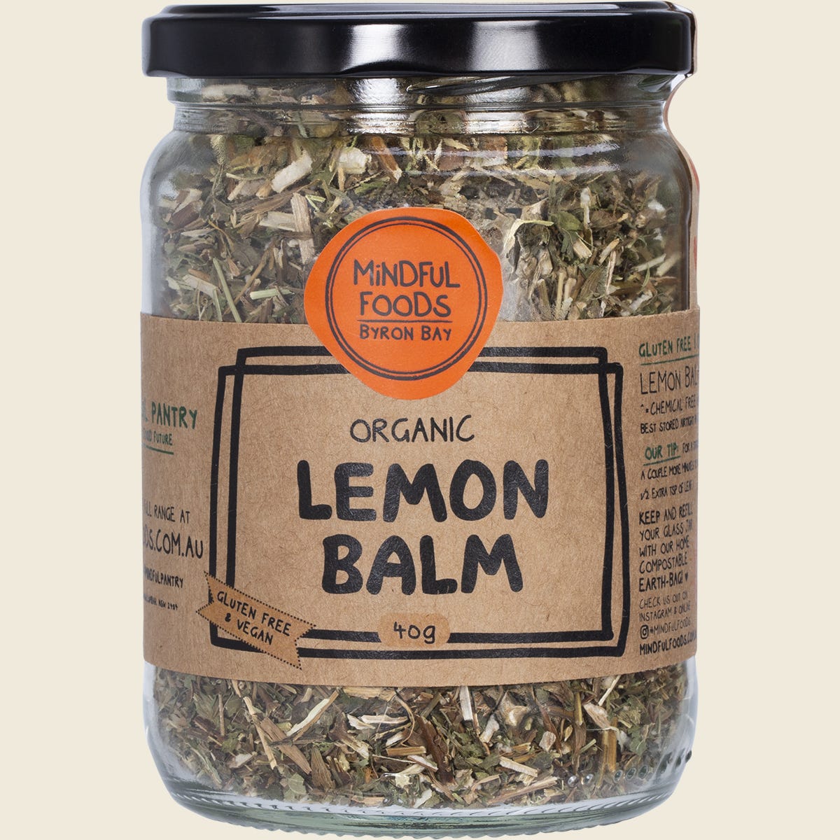 Mindful Foods Organic Lemon Balm 40g in a clear glass jar with a white and gold label and black lid.