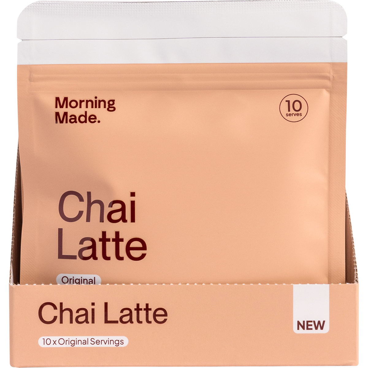 A white and orange display box for Morning Made Original Chai Latte containing 12 individual 50g sachets.