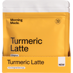 Front of a gold and white box for Morning Made Original Turmeric Latte featuring 12 sachets.
