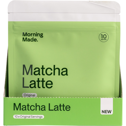 Display box containing 12 individual 50g bags of Morning Made Original Matcha Latte with green and white branding.
