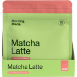 Pink and white display box containing 12 individual 50g sachets of Morning Made Strawberry Matcha Latte.