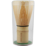 Traditional Japanese bamboo matcha whisk (chasen) with fine tines, used for frothing matcha tea.