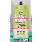 A squeeze pouch of Mingle Everything Dressing in Tangy, Vinaigrette flavor, 220g. The packaging features a light green upper section, a red banner with white text, a beige lower section, and a teal bottom section, all set against a textured gray background.