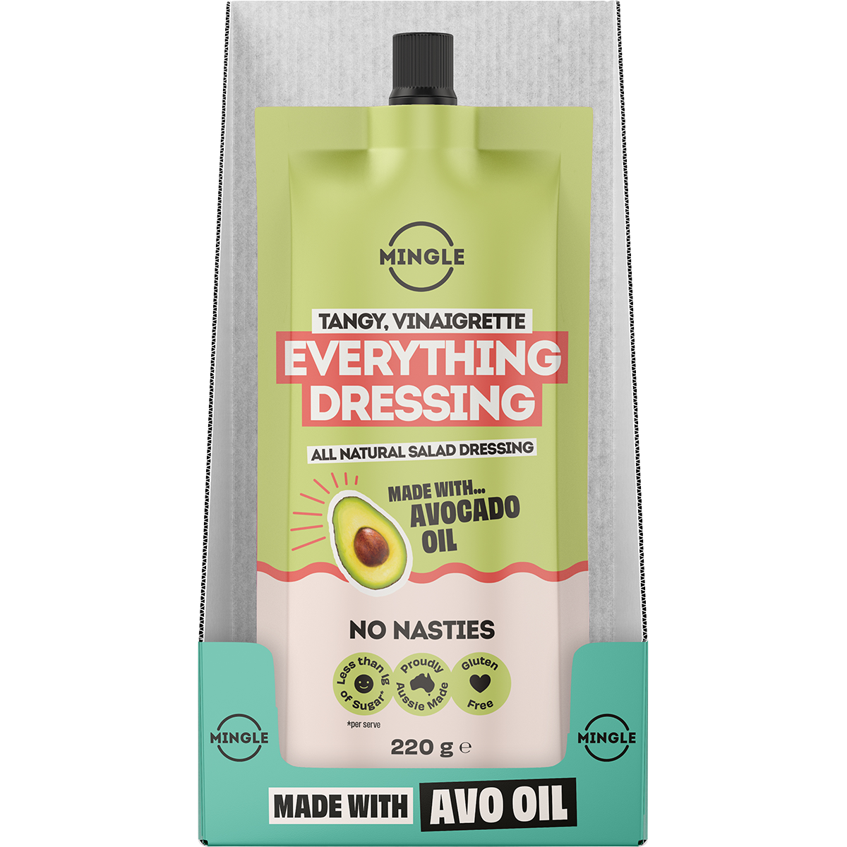 A squeeze pouch of Mingle Everything Dressing in Tangy, Vinaigrette flavor, 220g. The packaging features a light green upper section, a red banner with white text, a beige lower section, and a teal bottom section, all set against a textured gray background.