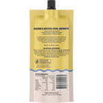Back view of a Minze Sesameing dressing pouch, showing the yellow upper section with black text, a wavy blue line, and a beige lower section with nutrition facts and a barcode.