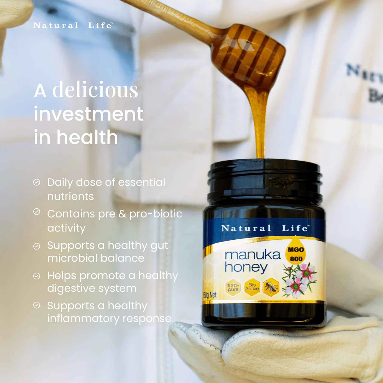Side view of a Natural Life Manuka Honey MGO 800 jar showing nutritional information and a blue and gold label.