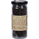 130g glass jar of Mindful Foods Organic Whole Black Peppercorns with a black and white label.