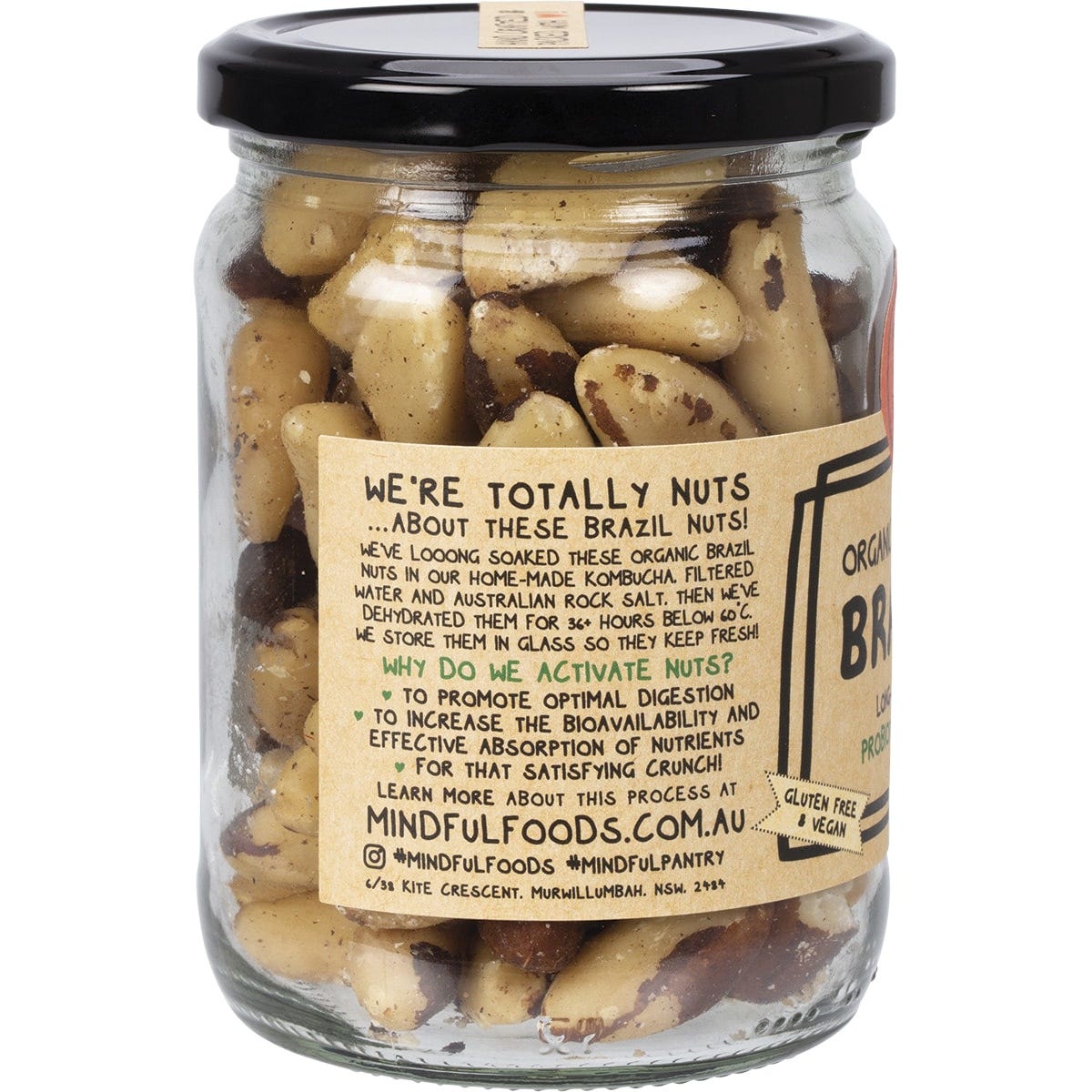 Mindful Foods 300g glass jar of organic activated Brazil nuts with a brown and white label.