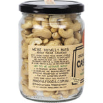 Mindful Foods 250g glass jar of organic and activated cashews with a white and gold label on a white background.