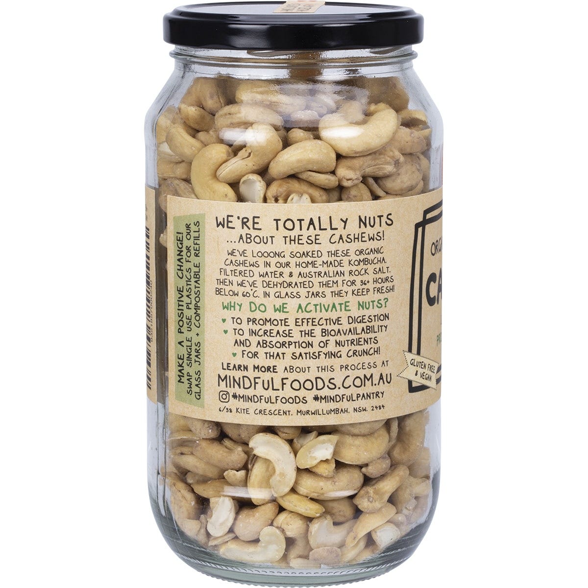 A 500g glass jar of Mindful Foods Organic & Activated Cashews on a white background.