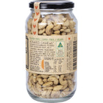 Side view of a 500g glass jar of Mindful Foods Activated Cashews showing nutrition facts and ingredients.