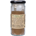 80g glass jar of Mindful Foods Organic Cinnamon (Ceylon) powder with a gold lid on a white background.