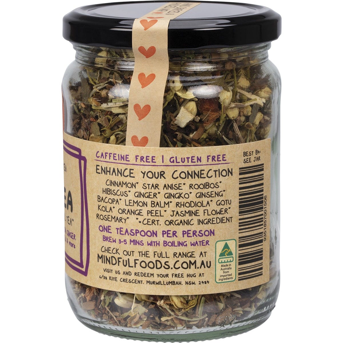 Close-up of loose Mindful Foods DMTea herbal tea with cinnamon, star anise, and hibiscus on a white background.