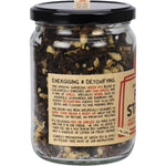 80g glass jar of Mindful Foods Fire Starter Organic Herbal Tea showing the back label with ingredients and directions.