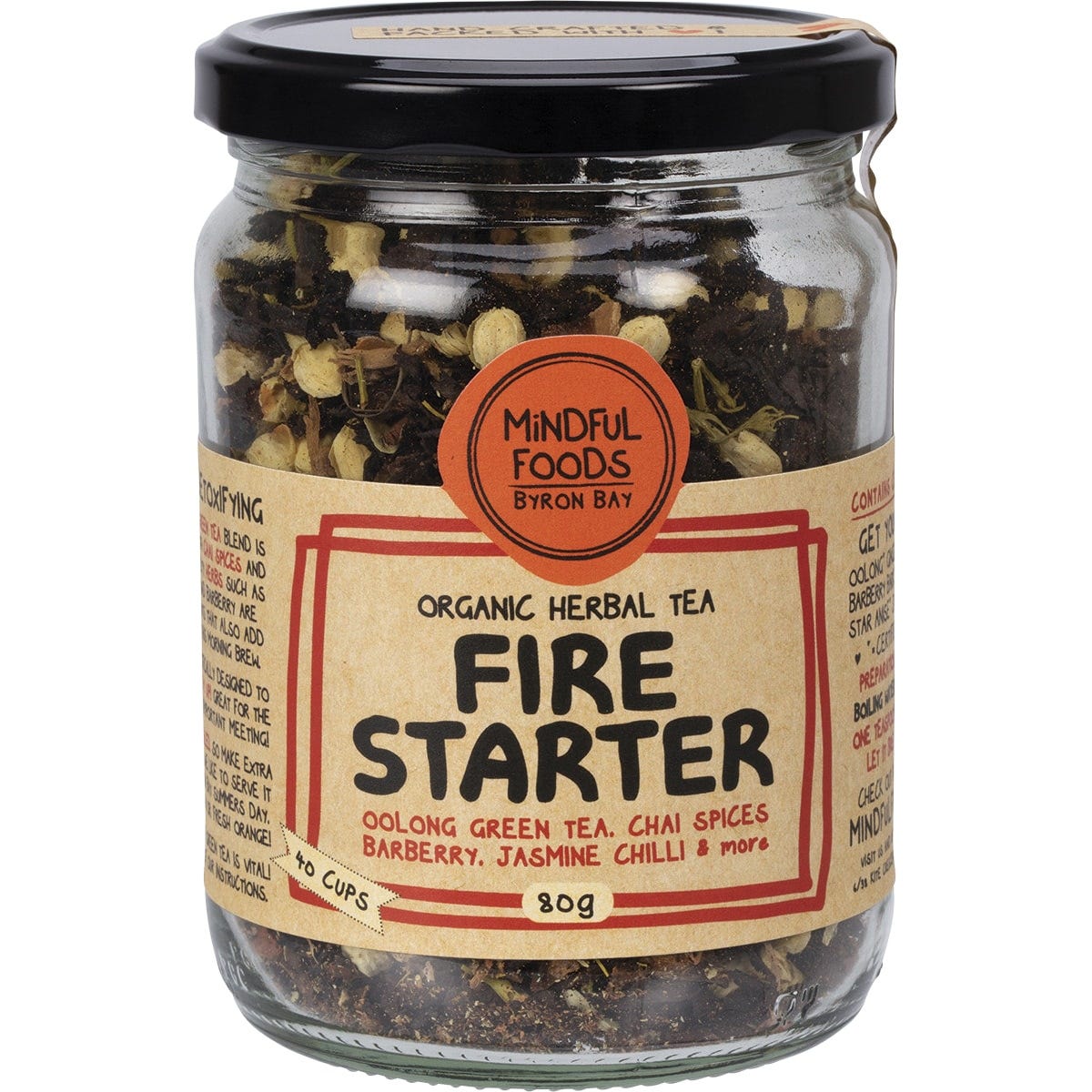 80g glass jar of Mindful Foods Fire Starter Organic Herbal Tea with oolong, spices, and a botanical label.