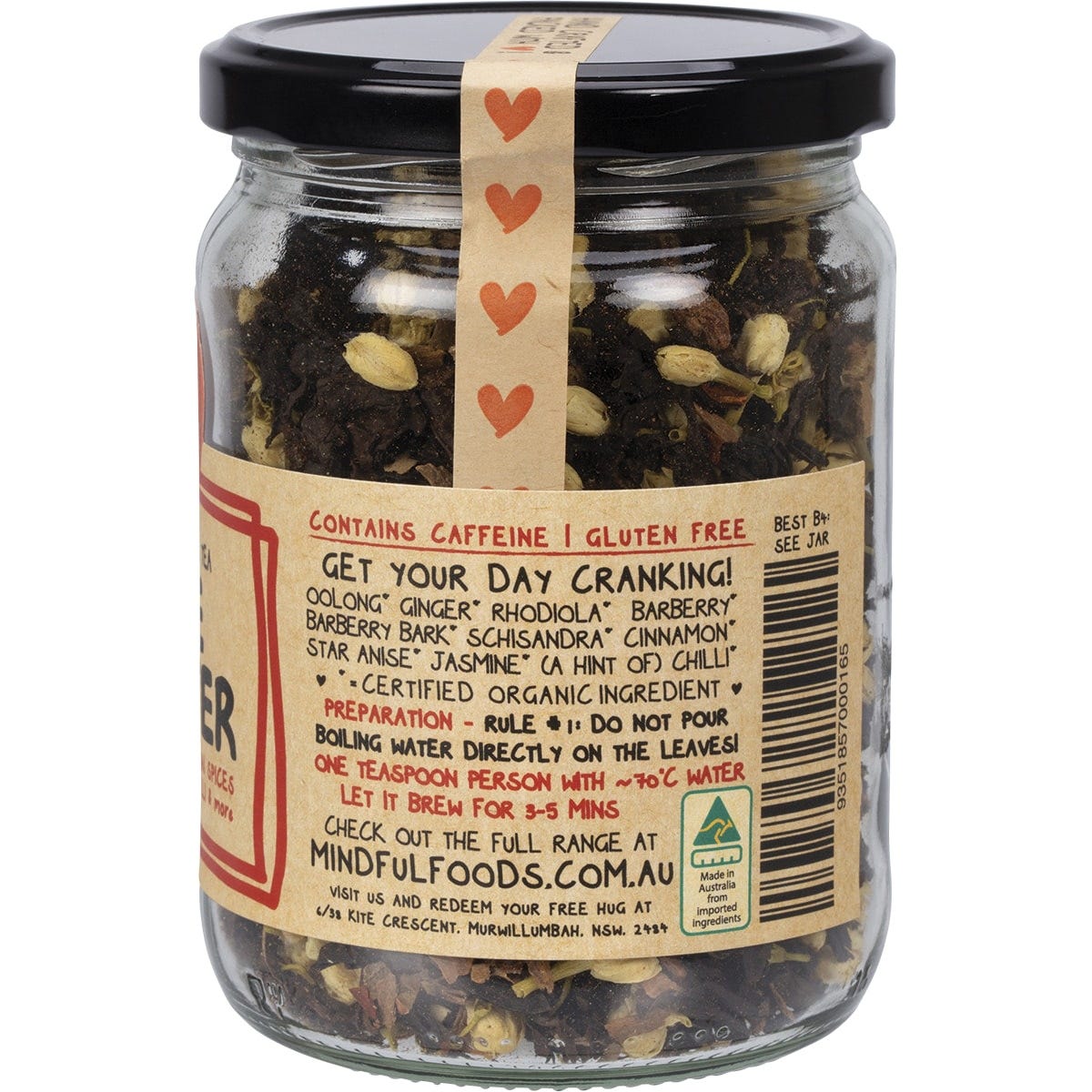 Loose leaf Mindful Foods Fire Starter Organic Herbal Tea with dried herbs, spices, and green tea leaves.