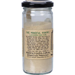 Mindful Foods 130g organic maca powder glass jar with gold lid and white label on a white background.
