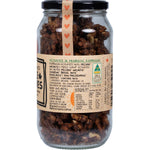 Close-up of Mindful Foods Maple Munchies organic activated nuts in an open 400g glass jar with a black lid.