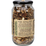 450g glass jar of Mindful Foods Mixed Nuts Organic & Activated with a white label and botanical illustrations.