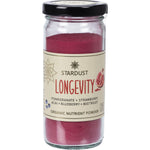 120g jar of Mindful Foods Stardust Longevity Organic Nutrient Powder with a red label and gold lid.