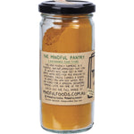 120g glass jar of Mindful Foods Organic Turmeric powder with a black lid on a white background.