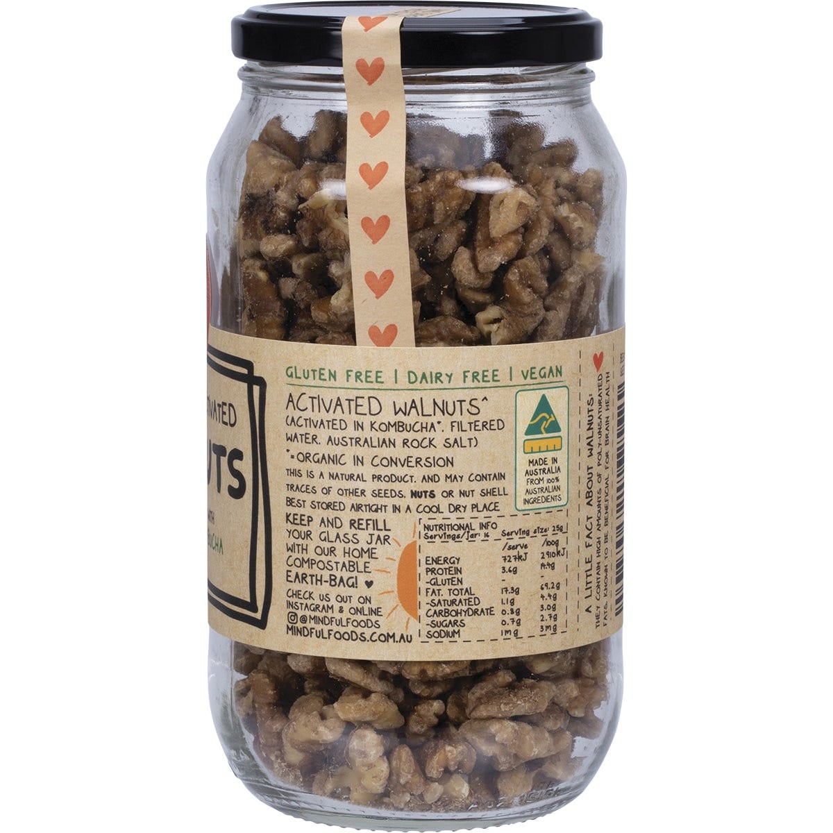 Glass jar of Mindful Foods organic activated walnuts showing the green label on a white background.