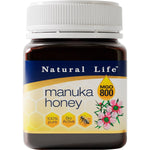 Natural Life Manuka Honey MGO 800 250g jar with a gold lid and a blue and gold label on a white background.