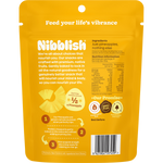 The back of a yellow and white Nibblish Gently Baked Pineapple 80g bag featuring nutritional facts and product details.