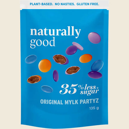 Blue package of 'naturally good' mylk partyz with colorful mylk balls on a beige background.
