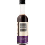 Right side of Natural Vanilla Company 50ml vanilla paste bottle showing ingredients, nutrition facts, and Halal logo.