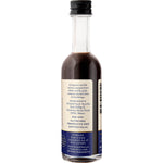 Natural Vanilla Company 50ml alcohol-free vanilla extract bottle shown from a left-side angle.