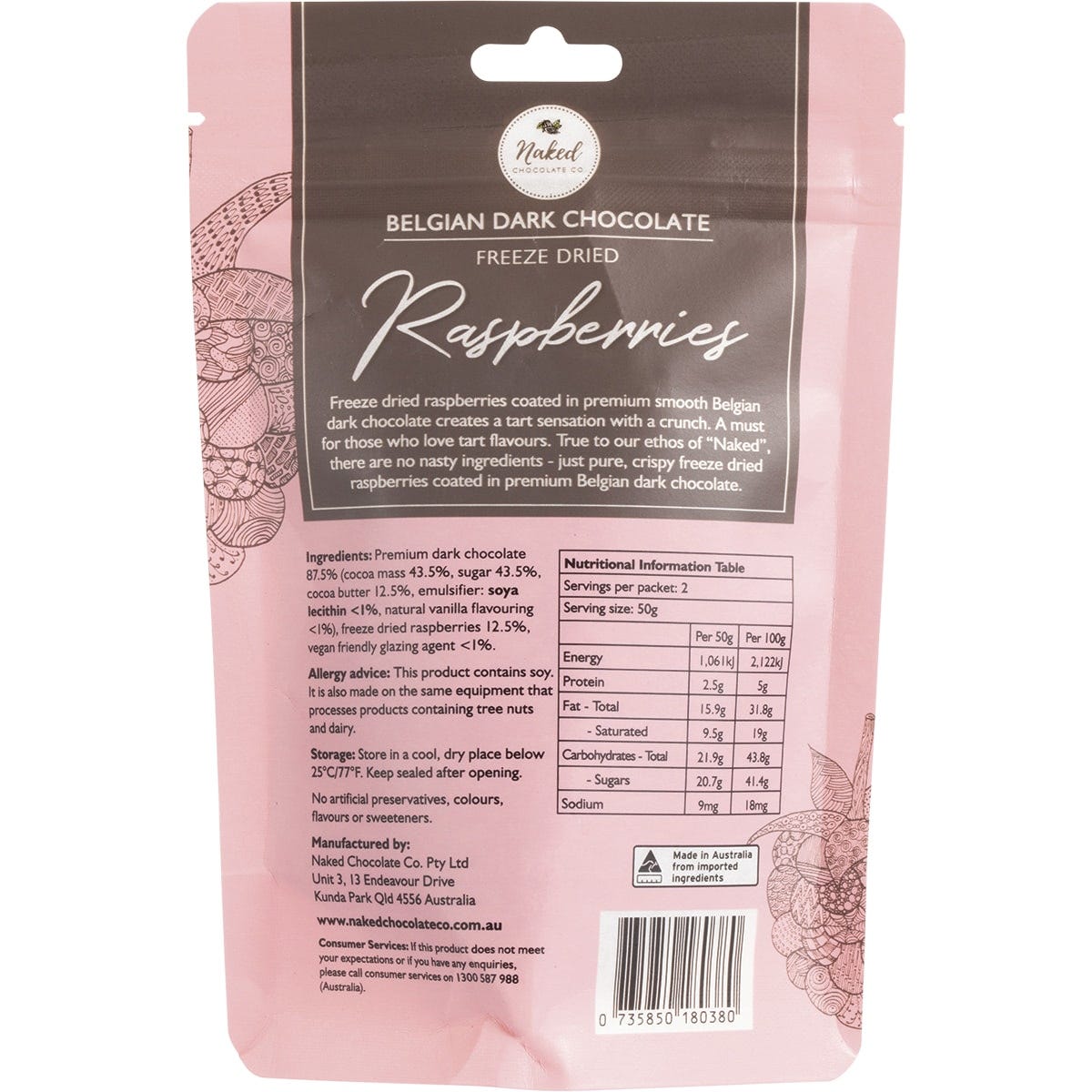 Dark chocolate-coated freeze-dried raspberries held in a hand with a whole fresh raspberry on a white background.