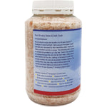 Nirvana Organics 1kg Himalayan Crystal Salt Detox Bath Soak tub with pink salt crystals and botanical illustrations.