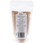 250g resealable bag of Nirvana Organics fine Himalayan crystal salt with pink minerals shown on a white background.