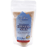 250g bag of Nirvana Organics fine Himalayan salt, featuring a blue and white label with pink salt crystals.