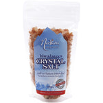Nirvana Organics 250g resealable pouch of pink Himalayan salt granules on a white background.