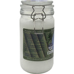 1L glass jar of Niugini Organics Virgin Coconut Oil with a white label and clip-top lid on a white background.