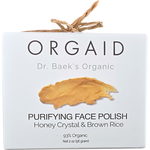 Front of Orgaid Purifying Face Polish box featuring honey crystal and brown rice illustrations on a white background.